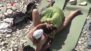 Beach Voyeur. Unashamed nudists having sex on the beach right near others porn video